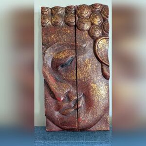 Beautiful two-piece hand-carved Buddha face made from cherry-toned colored wood